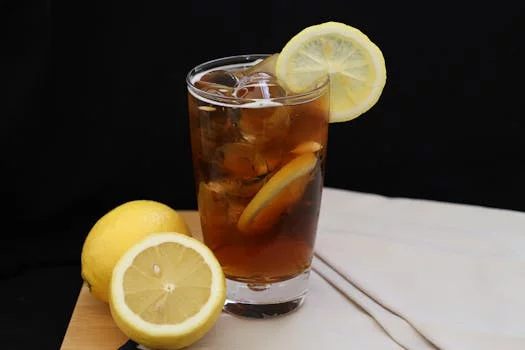 fresh lemonade in glass with ice